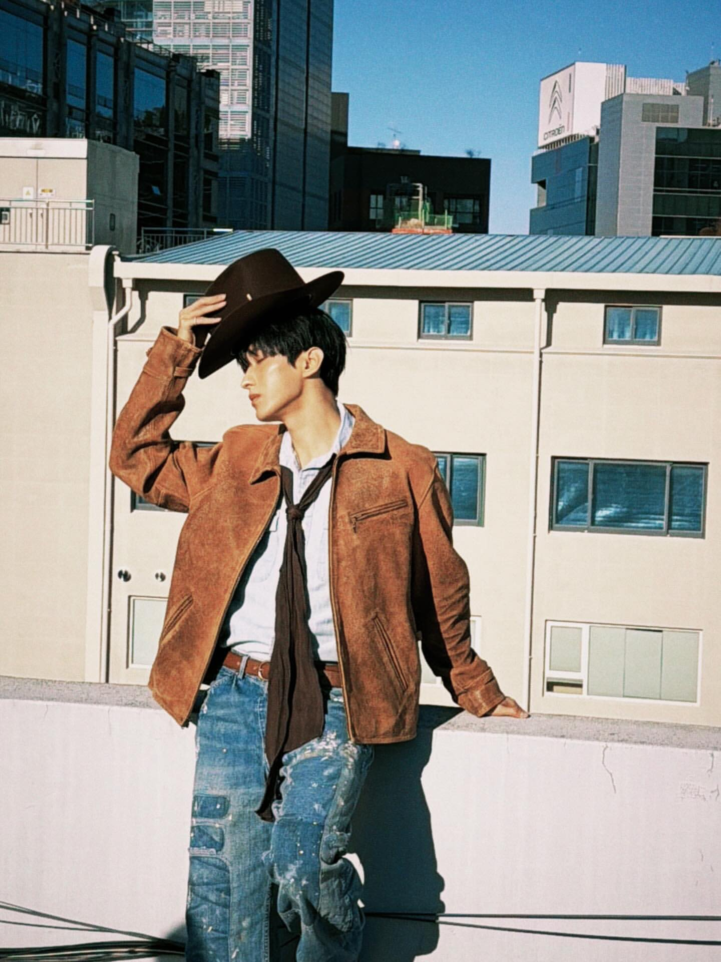 DK on Insta - posting behinds from his W Magazine shoot. A cowboy atop a building