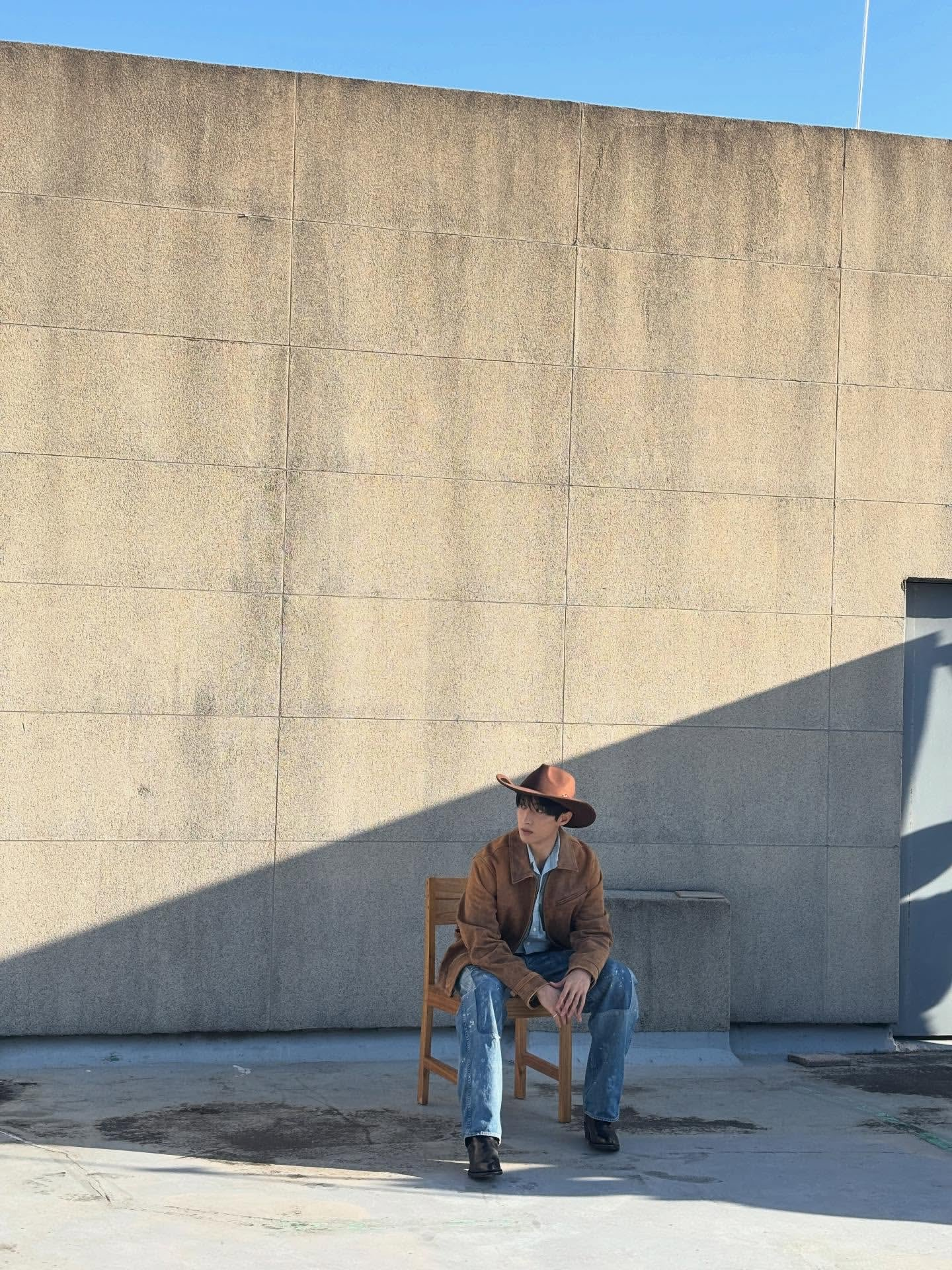 DK on Insta - posting behinds from his W Magazine shoot. A cowboy atop a building