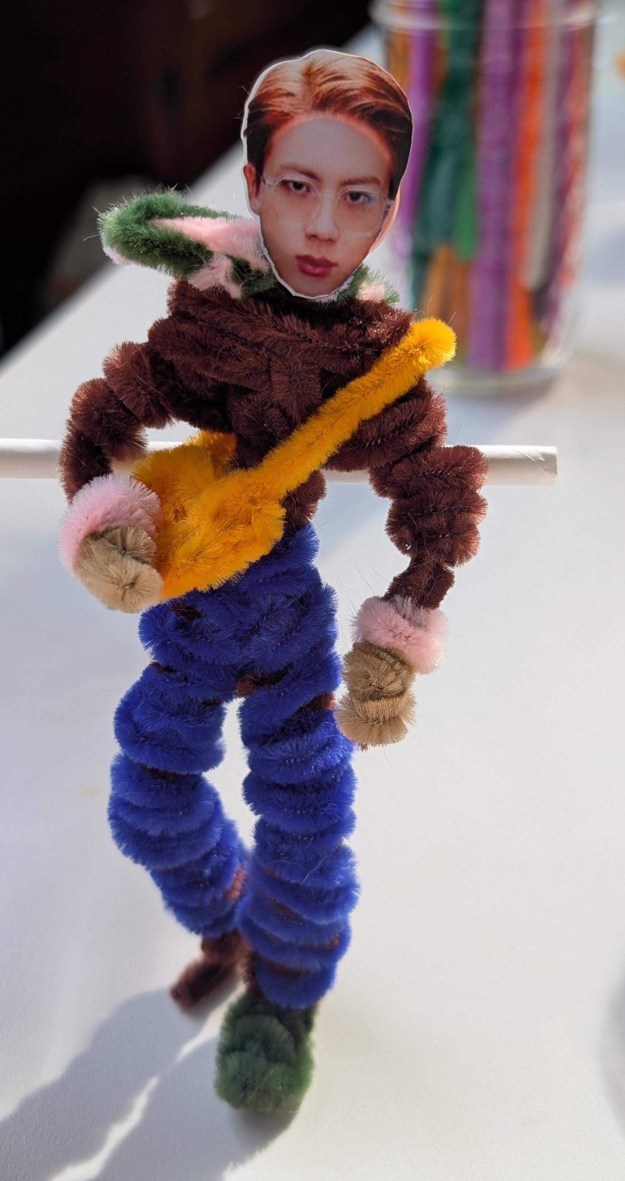 pipecleaner figure inspired by BTS' Jin from one of his iconic photo spreads,
another freebie for Arirang Stanford D2!