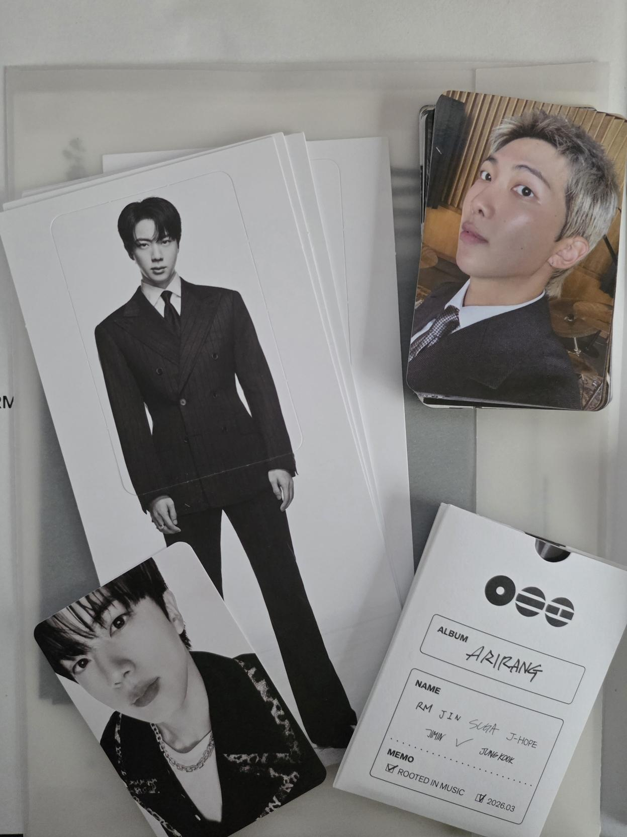 Arirang Photocards and the  Living Legends album. Jin and Namjoonie featured.