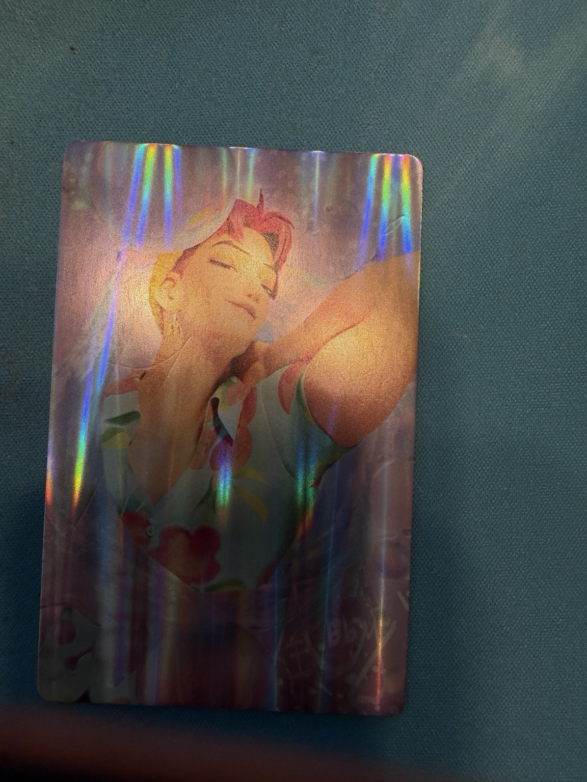 Abs from the Saja Boys posing on a photo card