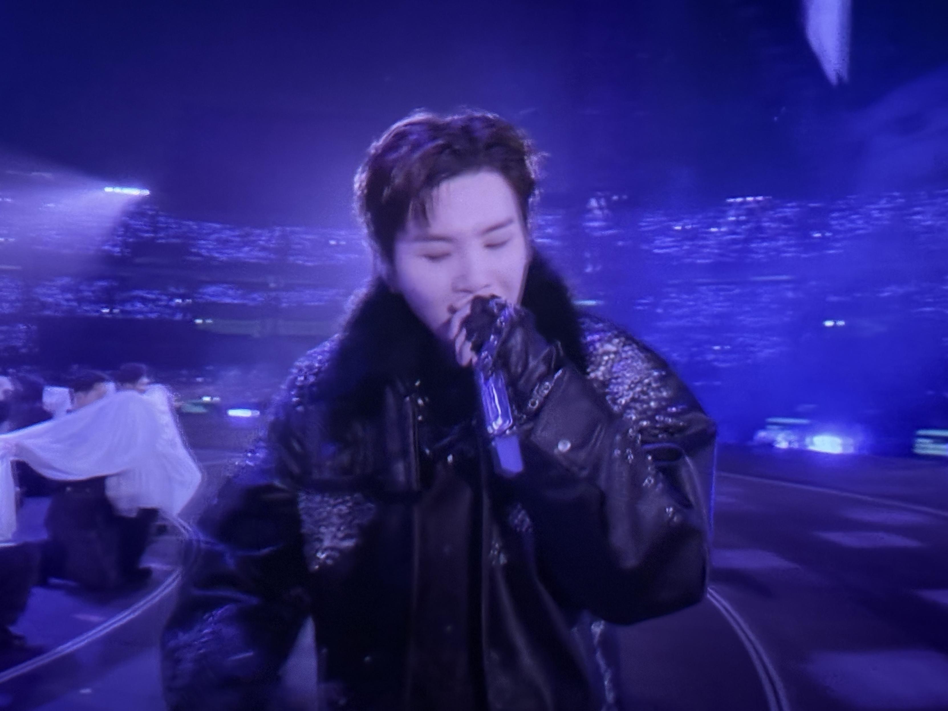 Picture of Suga rapping